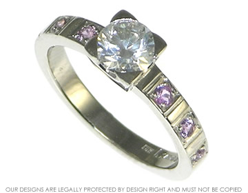 Palladium diamond and lilac  sapphire engagement ring. 