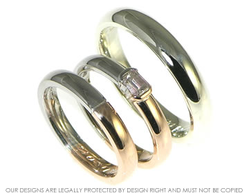 A pair of 9ct  gold wedding bands.