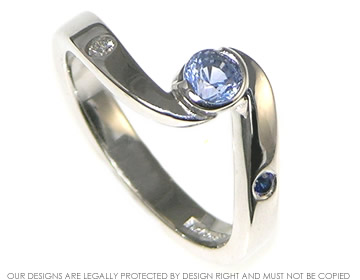 Bespoke 18ct white gold twist style engagement ring with  blue sapphire. 