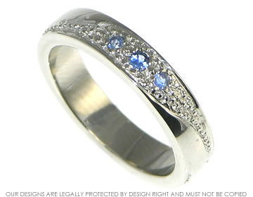 Gemma's platinum and pave set blue sapphire wedding ring