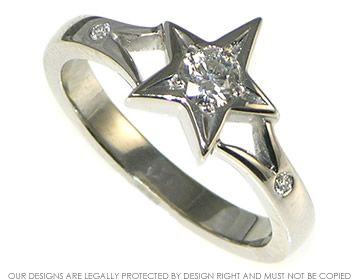 Palladium star inspired   diamond engagement ring. 