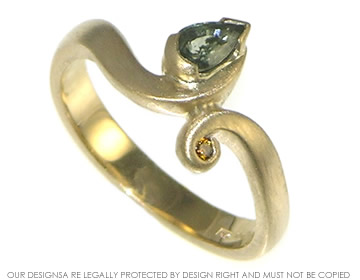 Bespoke 9ct yellow gold engagement ring with green sapphire and treated congac diamond