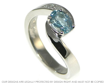 Palladium engagement ring with a 0.76ct Aquamarine