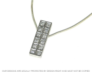 Ann wanted us to make a modern pendant using diamonds from an old bracelet 