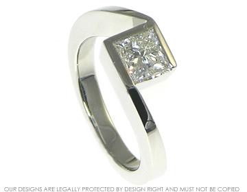 April's platinum engagement ring with a princess cut diamond