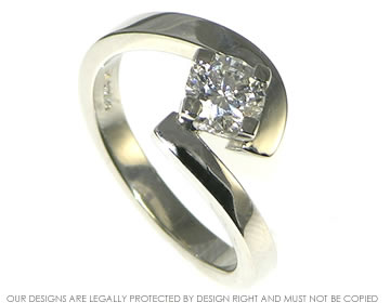 Platinum engagement ring with brilliant cut diamond