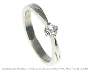 Bespoke platinum diamond solitaire engagement ring. 