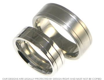 Ladies wide platinum wedding ring