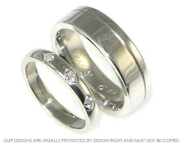 A pair of bespoke platinum wedding rings. 