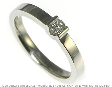 Palladium and recycled diamond solitaire engagement ring