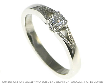 Platinum and Diamond Solitaire Engagement Ring in an Antique Style with Beaded Detailing