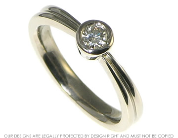 18ct white gold solitaire engagement ring inspired by tropical leaves 