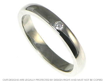 Bespoke 18ct white gold ladies wedding ring with an H Si1 diamond