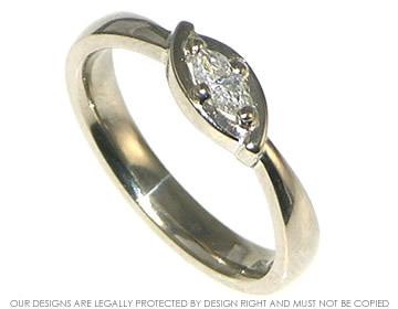 A Celtic inspired 18ct  white gold  diamond engagement ring.