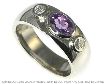 Palladium violet sapphire and diamond engagement ring. 