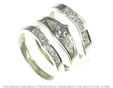 Silver and palladium diamond engagement  and wedding ring set. 







