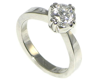 Platinum engagement ring with brilliant cut E VS2 diamond.