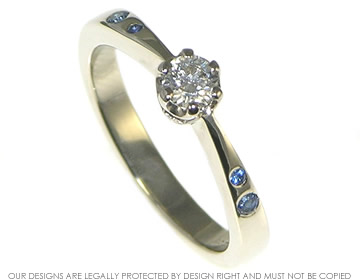 18ct White gold diamond engagement ring with blue sapphires 