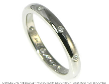 Platinum and diamond wedding ring