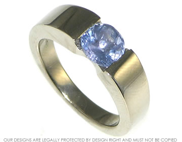 Bespoke 18ct white gold engagement ring with the customer's own sapphire