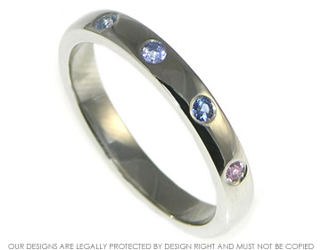 Platinum eternity ring with graduating sapphires