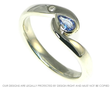 A 9ct white gold sapphire and diamond engagement ring.   