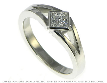 Platinum Art Deco diamond engagement ring with 0.54ct princess cut diamond.