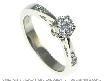 Bespoke platinum and 0.43ct diamond and aquamarine engagement ring 