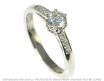 Platinum and 0.75ct brilliant cut diamond engagement ring.