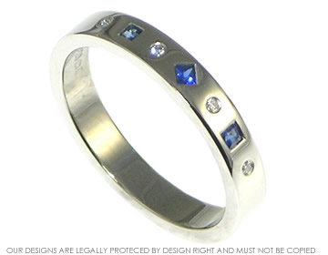 Palladium eternity ring with sapphires and diamonds set at different angles