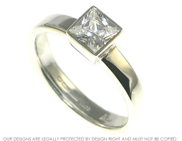 Sterling silver dress ring with an all around set princess cut cubic zircon