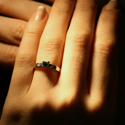 18ct white gold, 0.40ct natural african green sapphire and grain set diamond engagement ring
