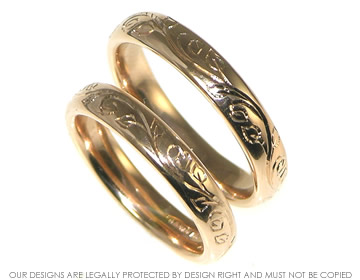 A pair of bespoke 18ct rose gold wedding rings. 