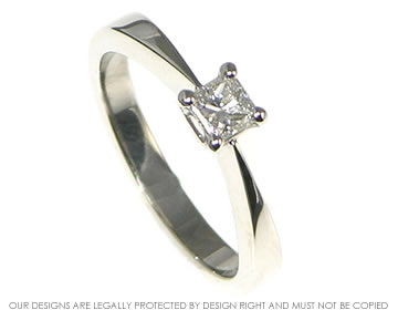 Bespoke platinum solitaire engagement ring with a princess cut diamond