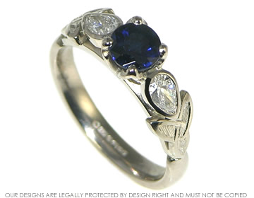 Bespoke sapphire and diamond engagement ring.