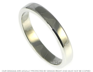 Hand worked 9ct white gold ladies wedding band in a narrow profile that's flat in shape.