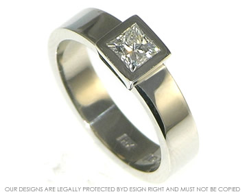 Palladium  and princess cut diamond engagement ring. 