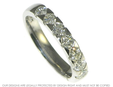 Bespoke palladium eternity ring with the customer's own diamonds