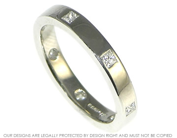 Bespoke platinum ladies princess cut diamond wedding ring. 