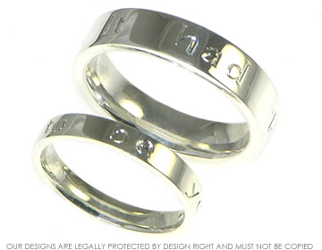 Bespoke 9ct white gold ladies wedding ring with engraved detailing. 