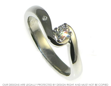 Bespoke platinum and diamond twist style engagement ring