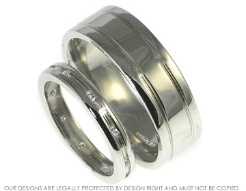 A pair of bespoke platinum wedding rings. 