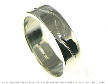 Bespoke 9ct white gold mans wedding ring with engraved detailing