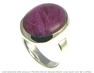 Dramatic rounded 14.09cts ruby matrix ring