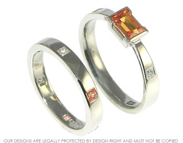 Bespoke palladium baguette cut 0.81ct orange sapphire and diamond engagement ring