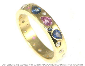 Bespoke eternity ring with pear cut and brilliant cut stones