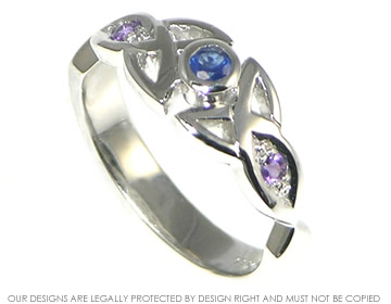 9ct white gold blue sapphire celtic inspired engagement ring. 