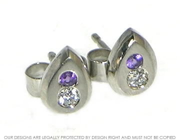 Palladium diamond and Ametyhst earrings.  