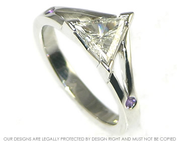 Platinum and trilliant diamond engagement ring