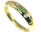 18ct yellow gold eternity ring with emeralds and diamonds